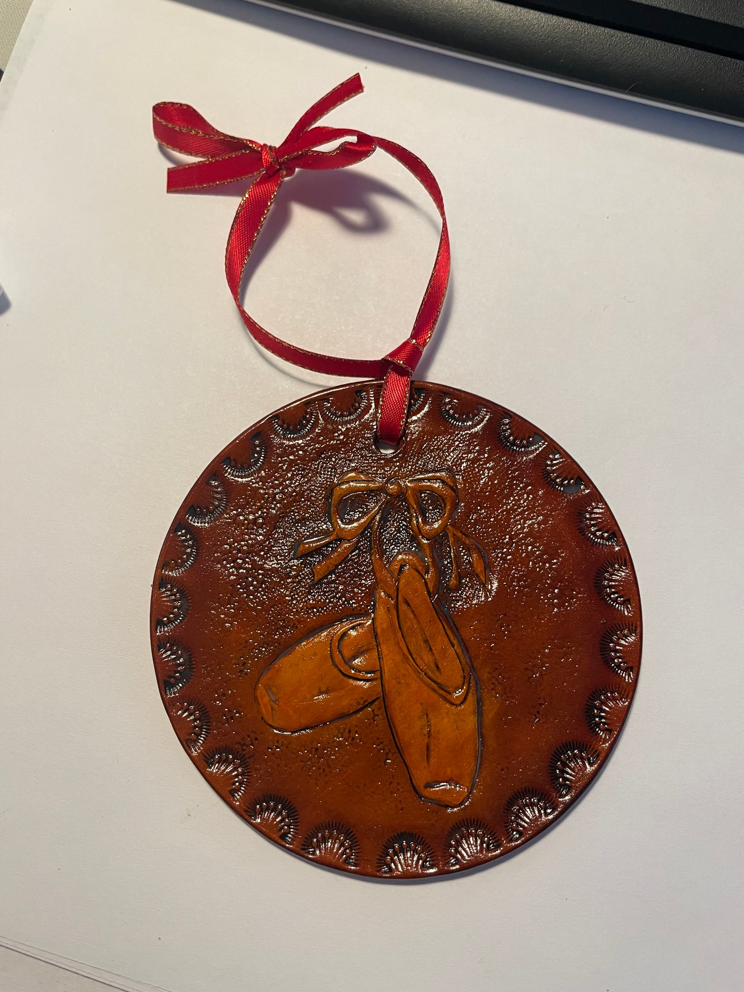 Hand-tooled leather ornament - ballet pointe shoes